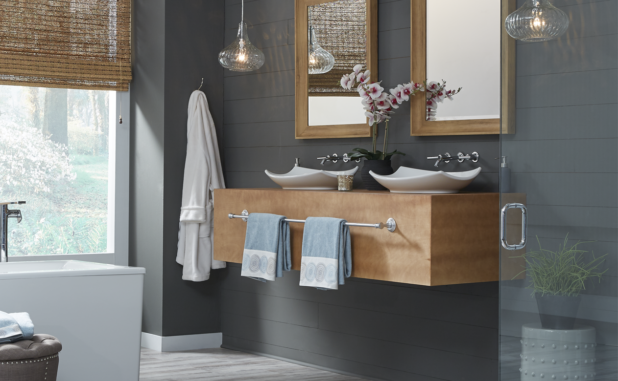 Gray wood-look flooring in bathroom with shower