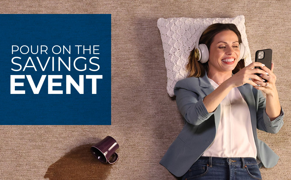 Woman on floor listening to music with spilled coffee next to her. 